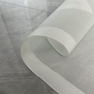 Plastic meshes crack under heat; parchment paper is single-use